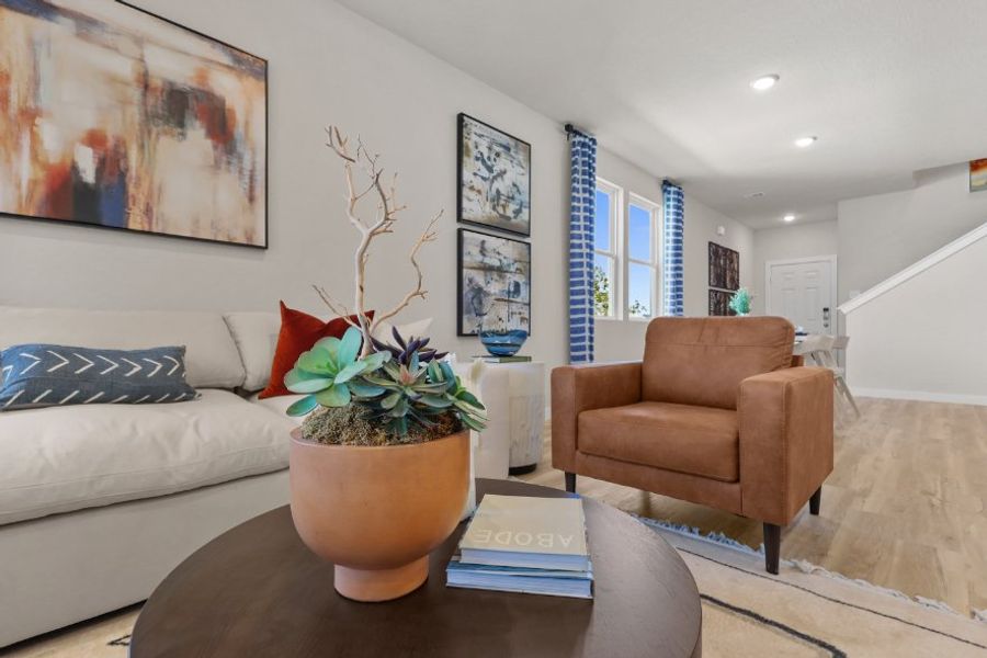 A living room with a couch and a coffee table.