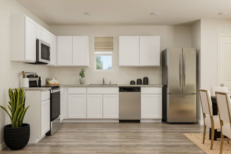 A kitchen with white cabinets. A kitchen with white cabinets.