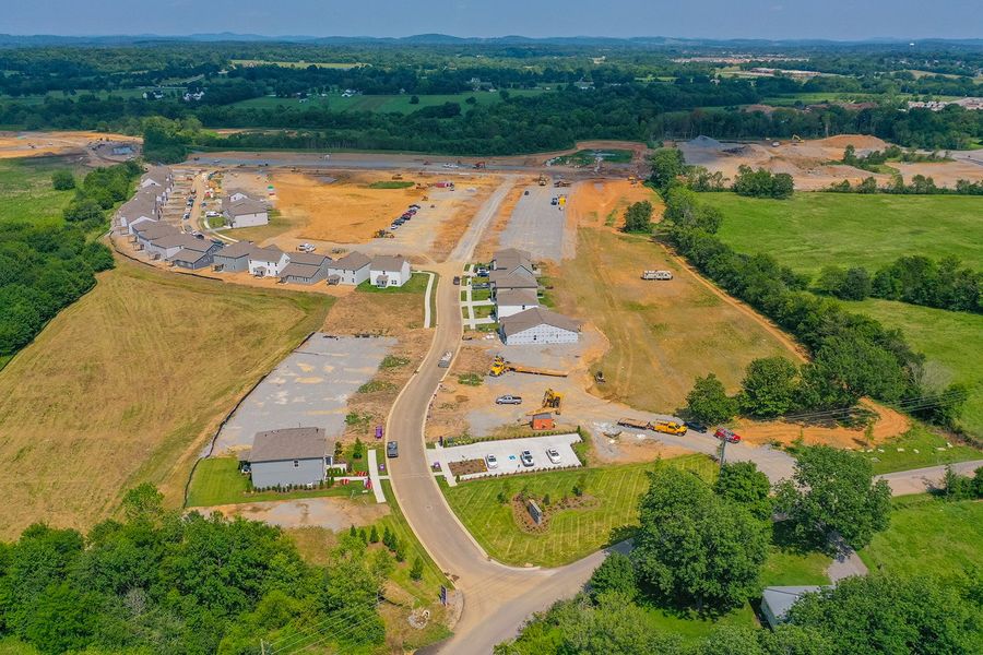 A road with a river and buildings. A road with a river and buildings.