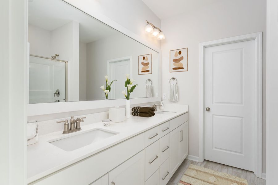 Furnished interior in a model home at River Hills in Shallotte (Image 11).