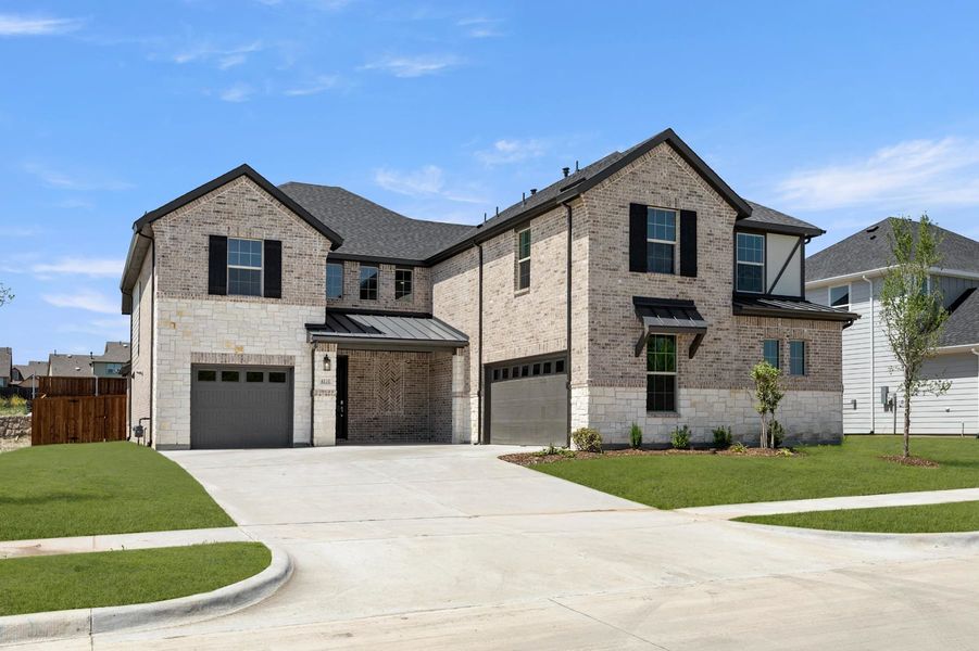 Front exterior of a home in the Somerset Park community, located in Rockwall, TX (Image 8).