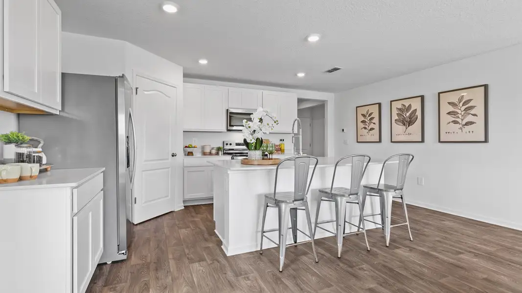 Furnished interior in a model home at Canopy Oaks in Kingsland (Image 4).