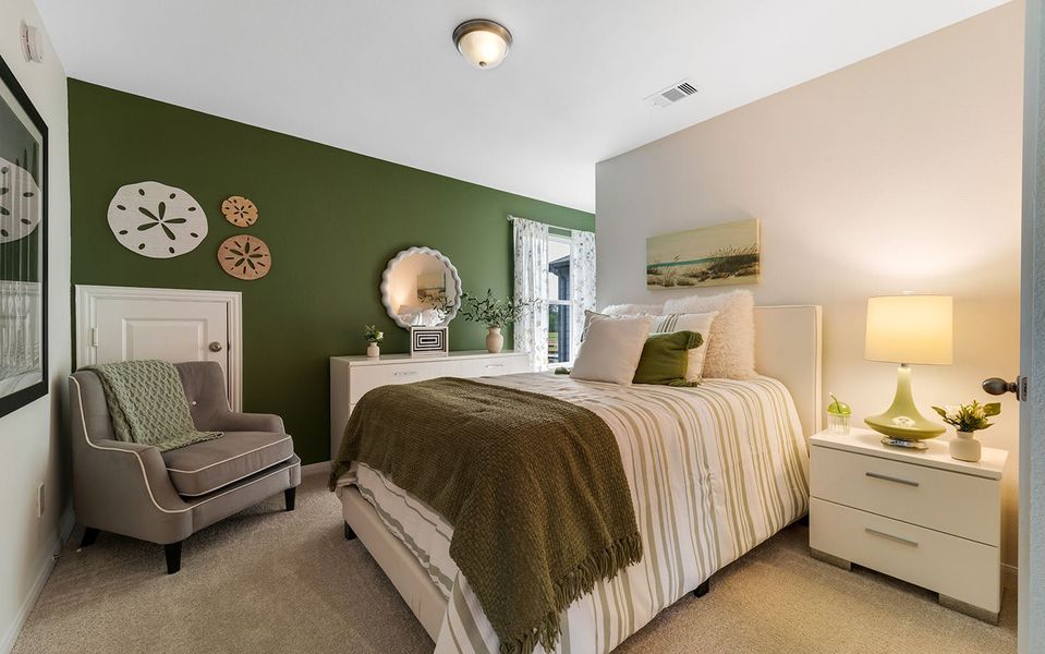 Furnished interior in a model home at The Pines at Seven Coves in Willis (Image 33).