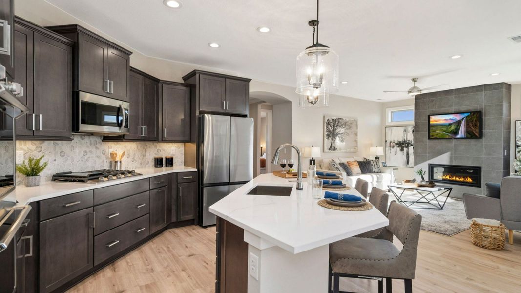 Furnished interior in a model home at The Courtyards at Lupton Village in Fort Lupton (Image 9).