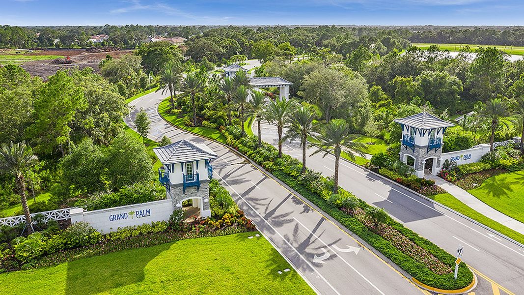 Entrance to the Grand Palm Real Estate and Homes for Sale in Venice, FL - Neal Communities community in Venice, FL, featuring signage and landscaping (Image 2). Entrance to the Grand Palm Real Estate and Homes for Sale in Venice, FL - Neal Communities community in Venice, FL, featuring signage and landscaping (Image 2).