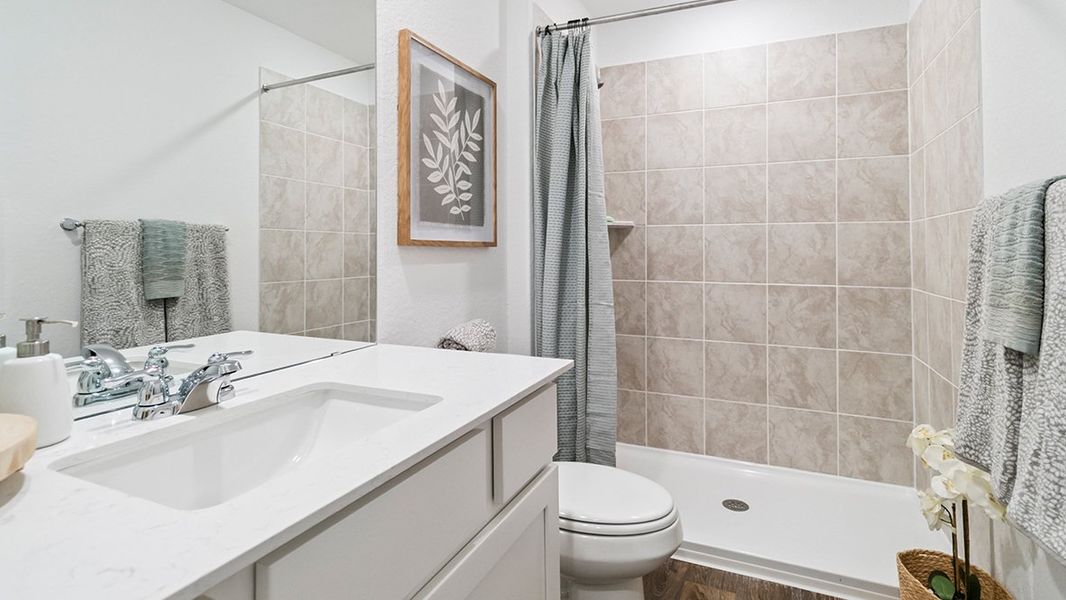 Furnished interior in a model home at Blue Ridge Ranch in San Antonio (Image 20).