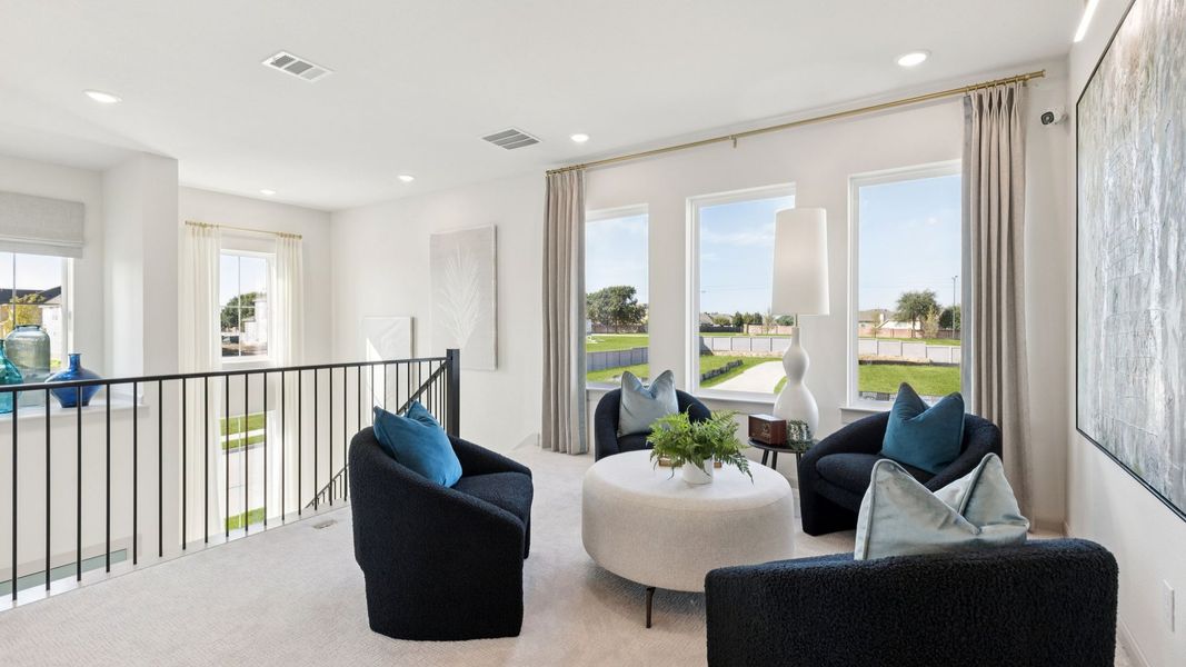 Furnished interior in a model home at Painted Tree - Woodland North in McKinney (Image 25).