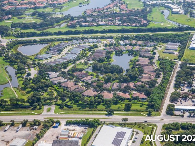 Aerial view of the The Falls at Grand Harbor community in Vero Beach, FL, showing layout and nearby surroundings (Image 12).