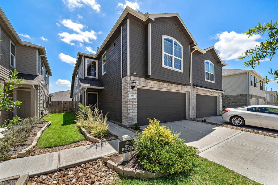 Front exterior of a home in the Haven at Kieth Harrow community, located in Cypress, TX (Image 2).
