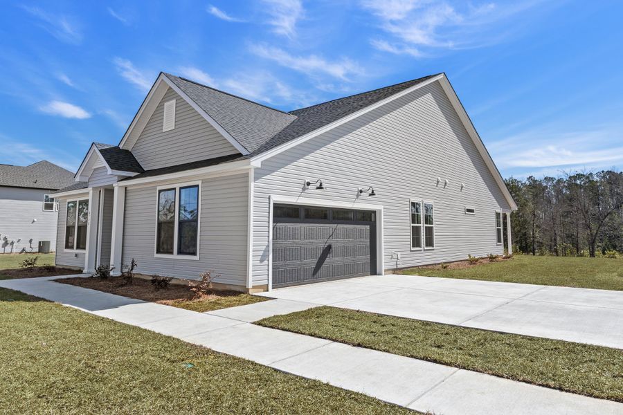Front exterior of a home in the Huckleberry Estates community, located in Conway, SC (Image 9).