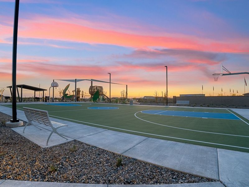 A basketball court with a sunset. A basketball court with a sunset.