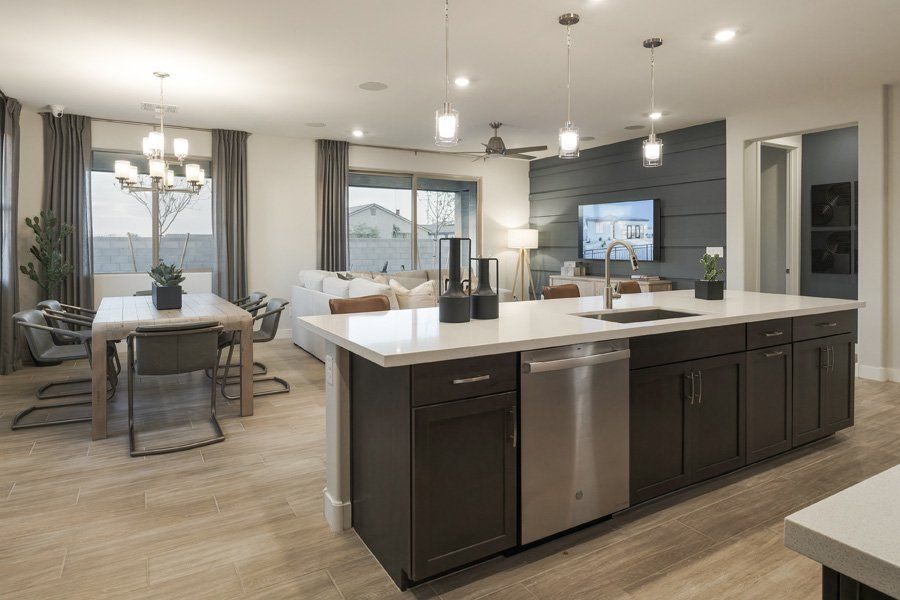 Furnished interior in a model home at Windrose V in Waddell (Image 29).