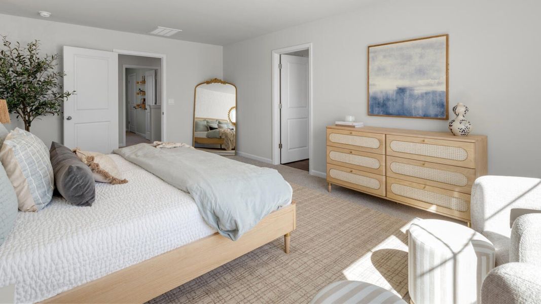 Furnished interior in a model home at The Grove at Blake Farm in Wilmington (Image 28). Furnished interior in a model home at The Grove at Blake Farm in Wilmington (Image 28).