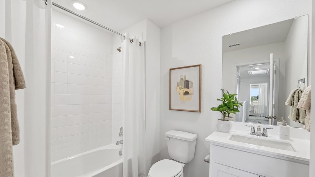 Furnished interior in a model home at Marigold in Kyle (Image 30).