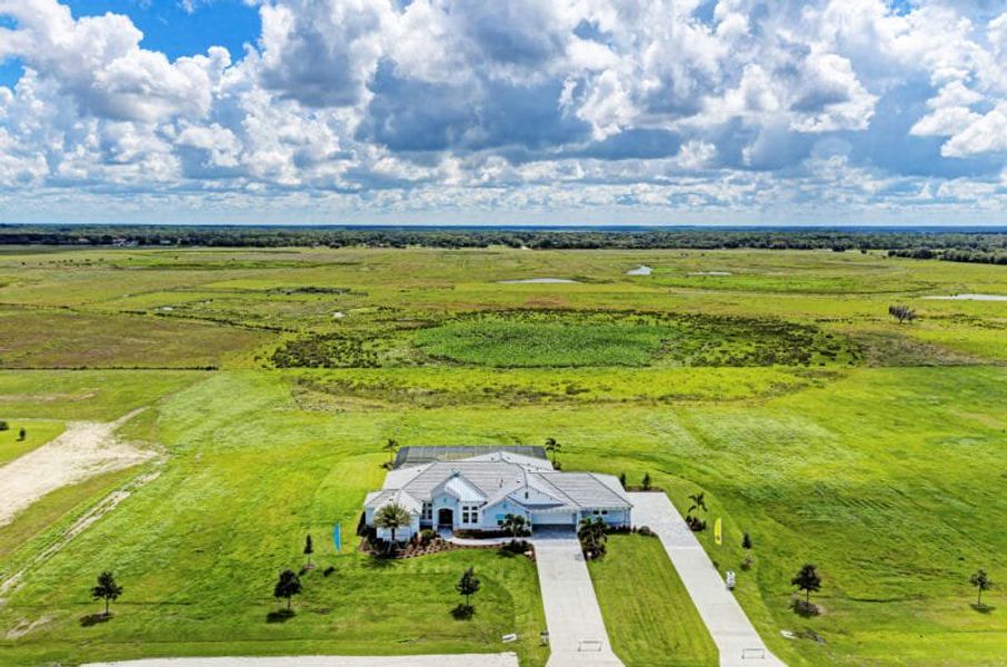 Aerial view of the Hampton Lakes community in Sarasota, FL, showing layout and nearby surroundings (Image 21). Aerial view of the Hampton Lakes community in Sarasota, FL, showing layout and nearby surroundings (Image 21).