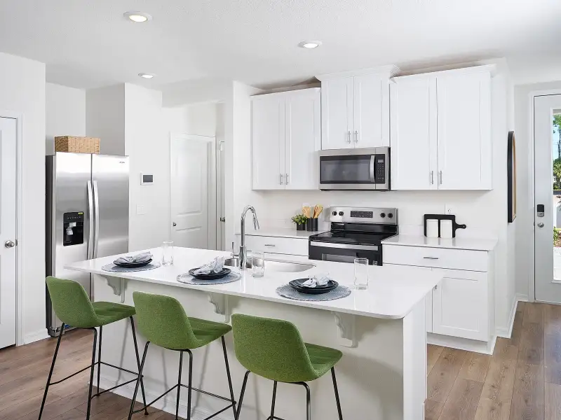 Furnished interior in a model home at Bradford Park in Ormond Beach (Image 2).