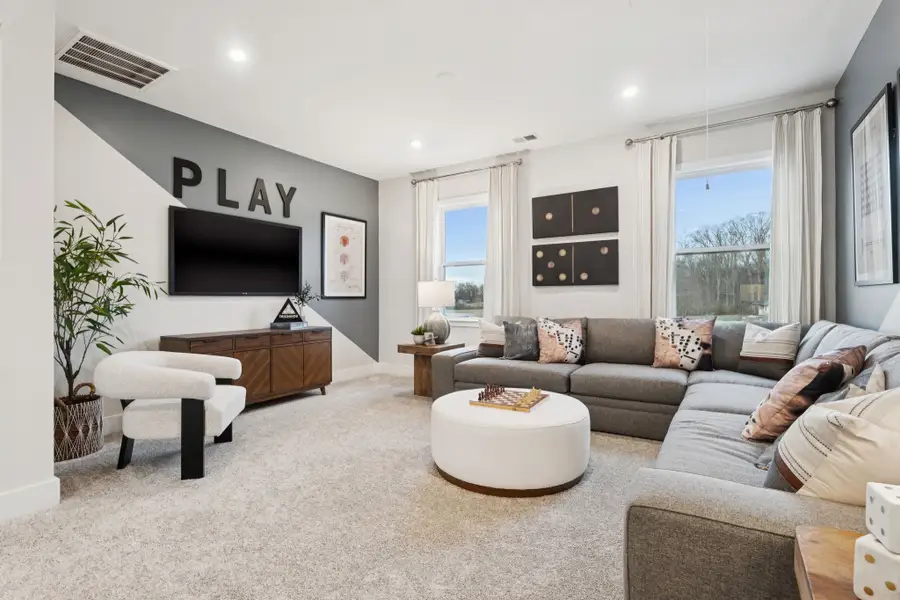 A living room with a fireplace.