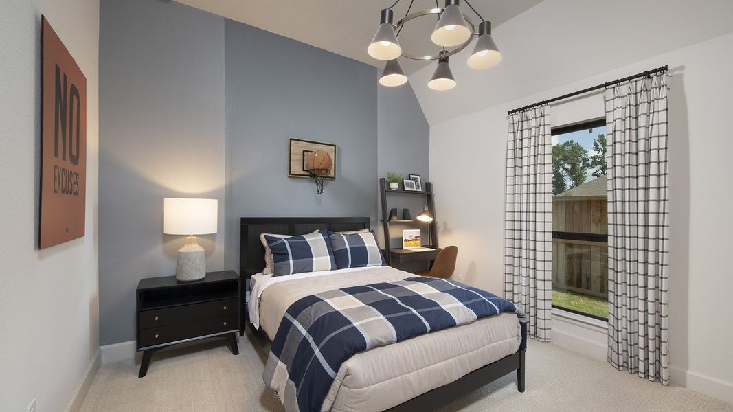 Furnished interior in a model home at The Highlands 65' in Porter (Image 21).