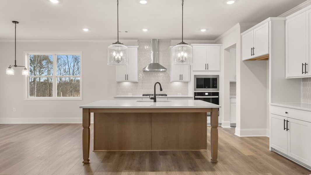 Furnished interior in a model home at Holland Estates in Powder Springs (Image 3).
