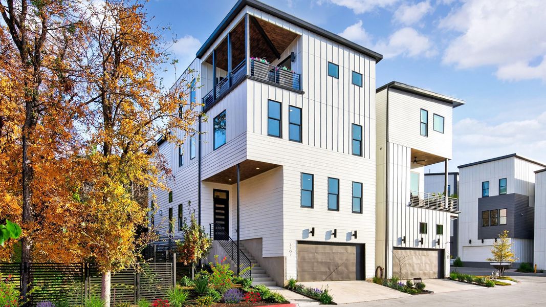 Front exterior of a home in the The Park at Sunridge community, located in Austin, TX (Image 13).