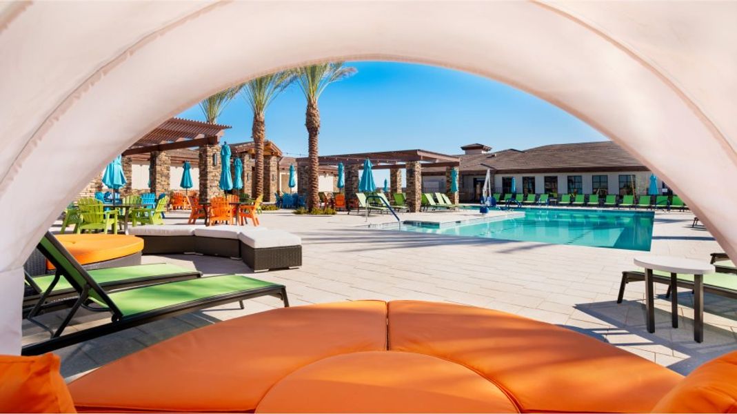 Shaded lounge area overlooking the pool