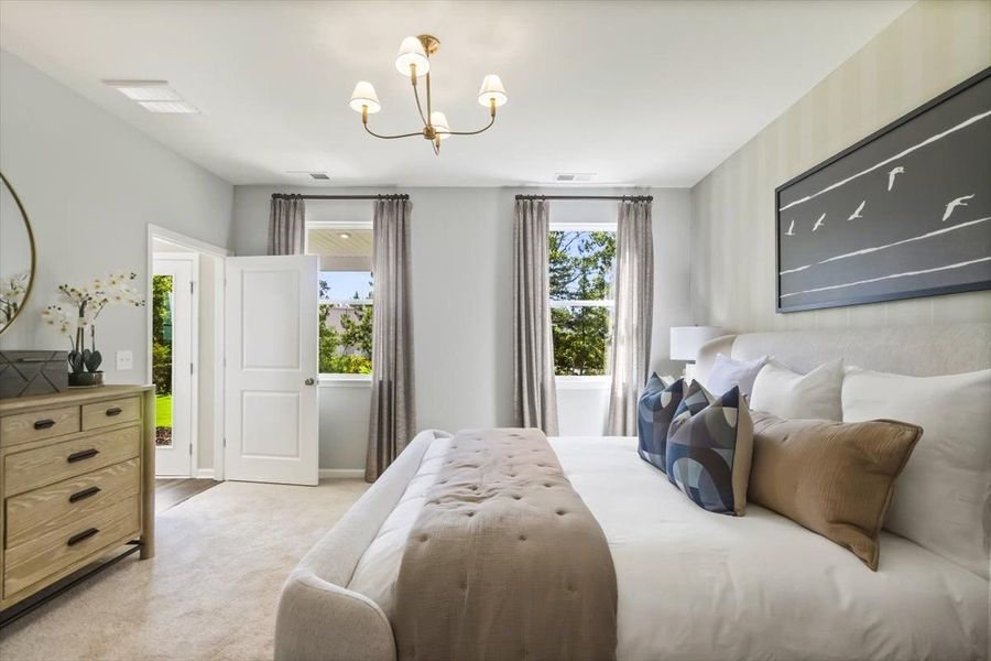 Spacious primary bedrooms with ensuite bathrooms.