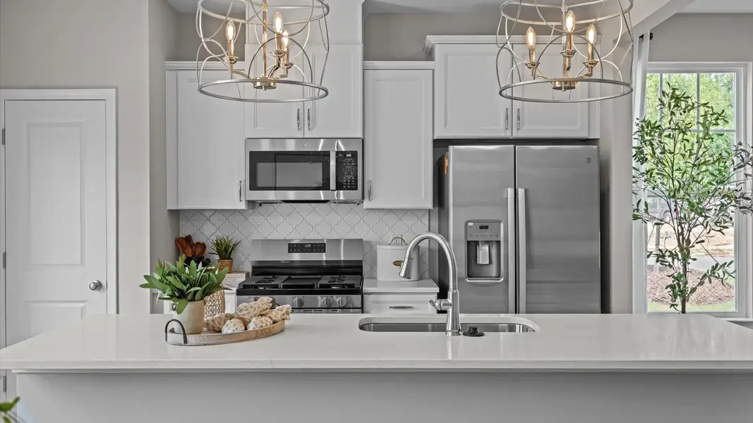 Furnished interior in a model home at Essex Townes in Franklinton (Image 7).