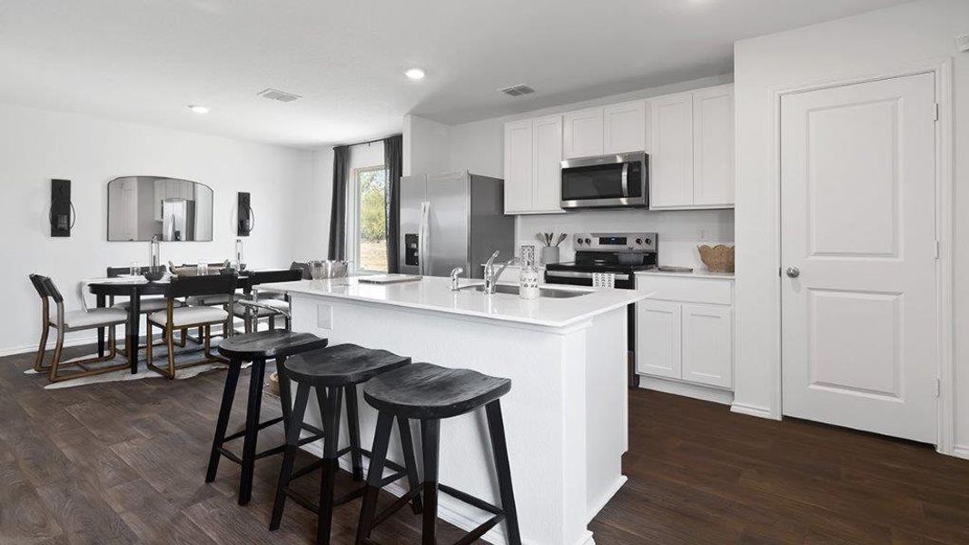 Furnished interior in a model home at Lucero in San Antonio (Image 9).