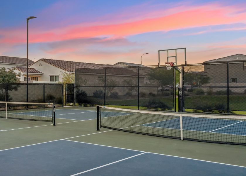 A tennis court with a net. A tennis court with a net.