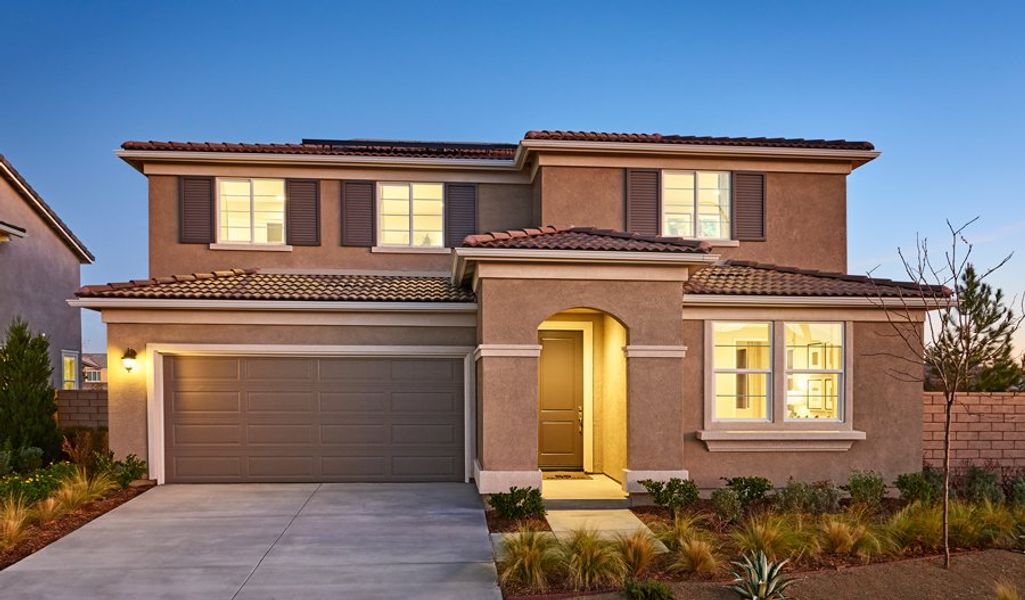 Front exterior of a home in the Desert Bloom at Monarch community, located in Marana, AZ (Image 1). Front exterior of a home in the Desert Bloom at Monarch community, located in Marana, AZ (Image 1).