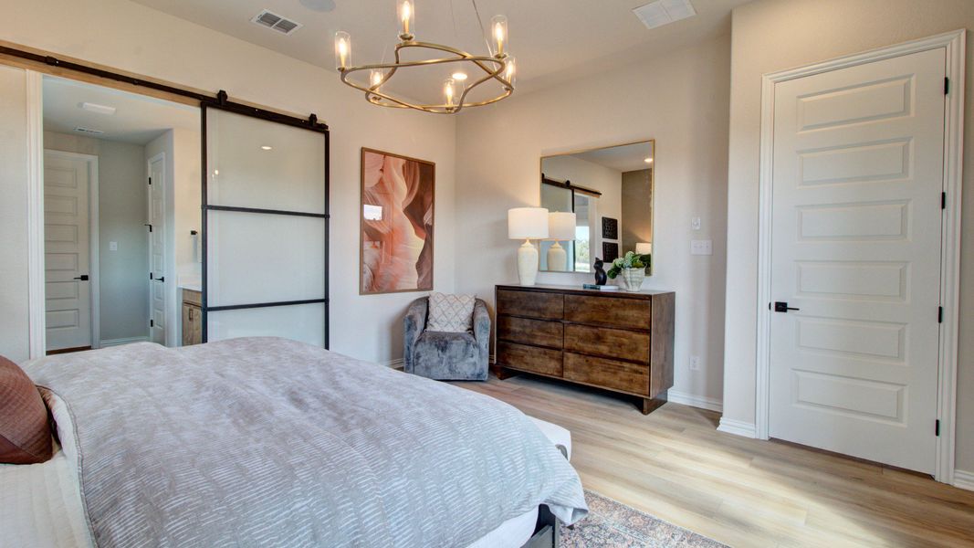 Furnished interior in a model home at Clear Creek in New Braunfels (Image 28).