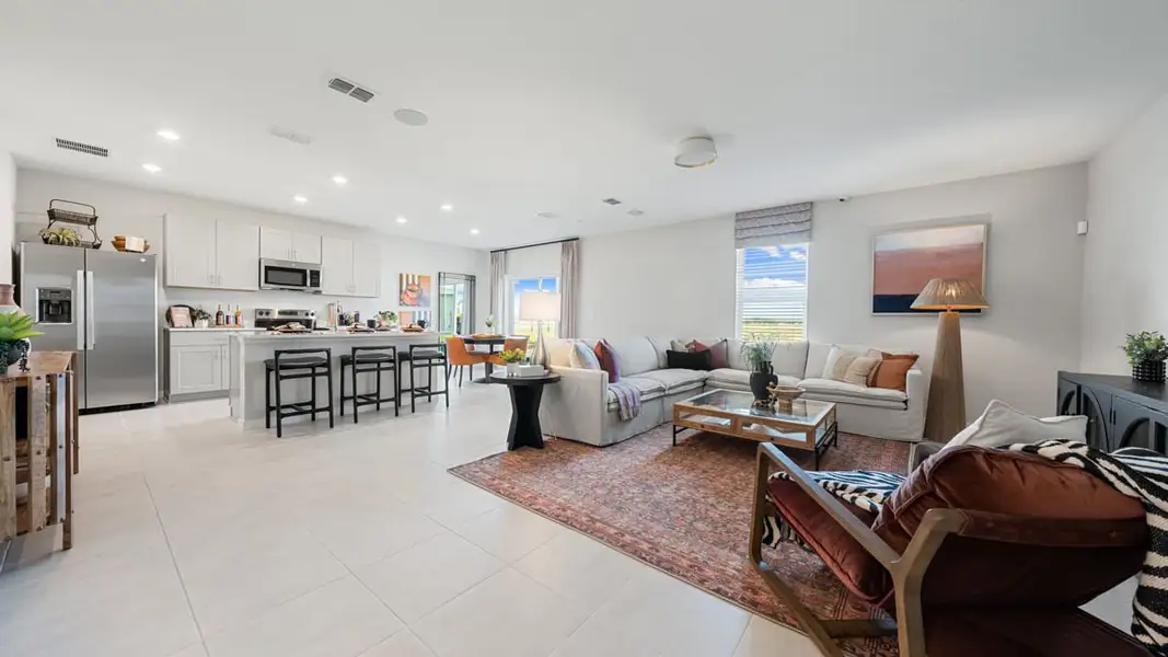 Furnished interior in a model home at Cove at Coasterra in Palmetto (Image 11).