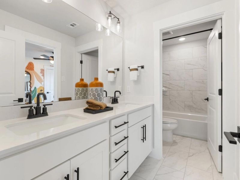 Furnished interior in a model home at Mercer Meadows in Royse City (Image 8).