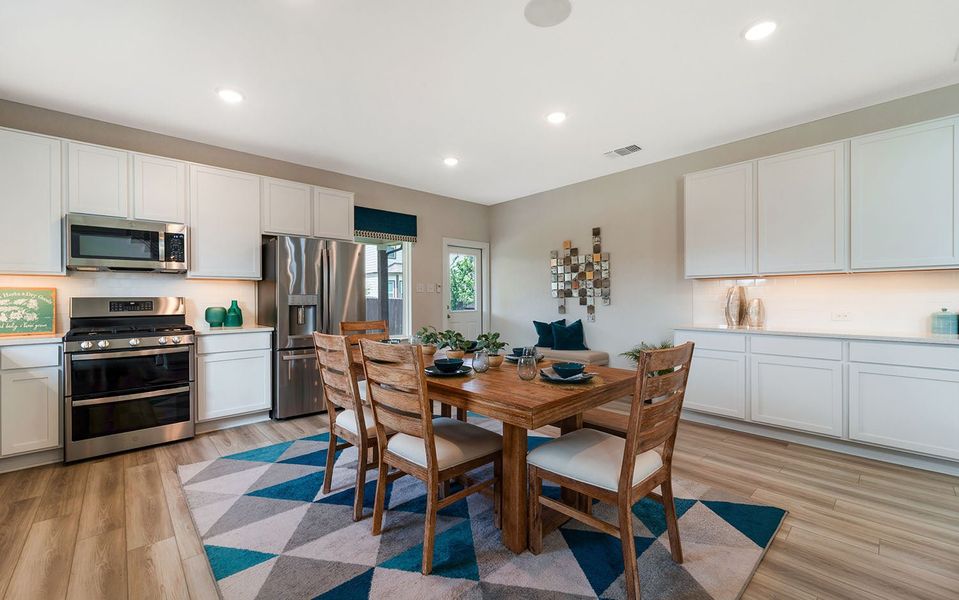 Furnished interior in a model home at Hunter's Ranch in San Antonio (Image 23).