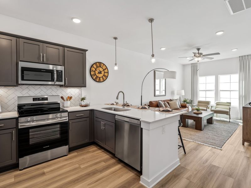 Furnished interior in a model home at The Towns at Red River in Gallatin (Image 10).