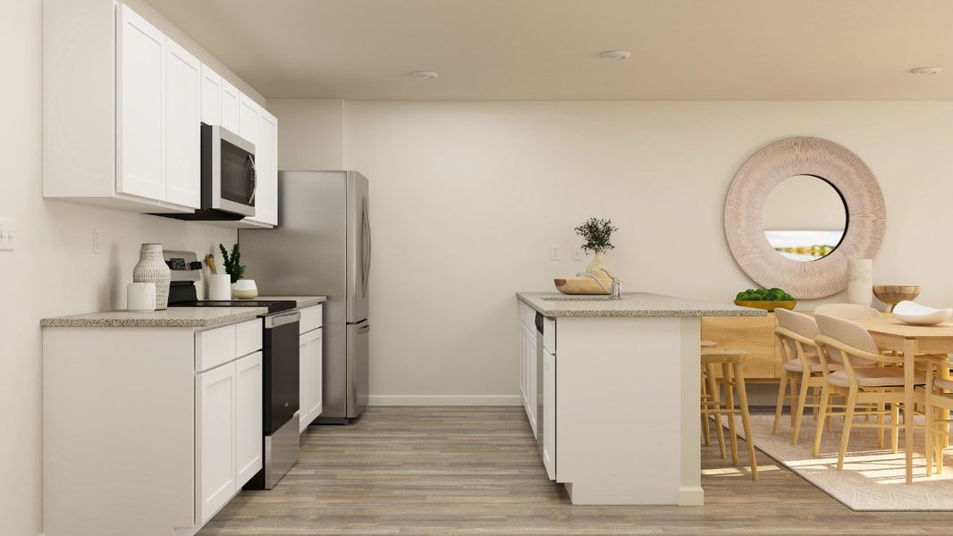 A kitchen with white cabinets. A kitchen with white cabinets.