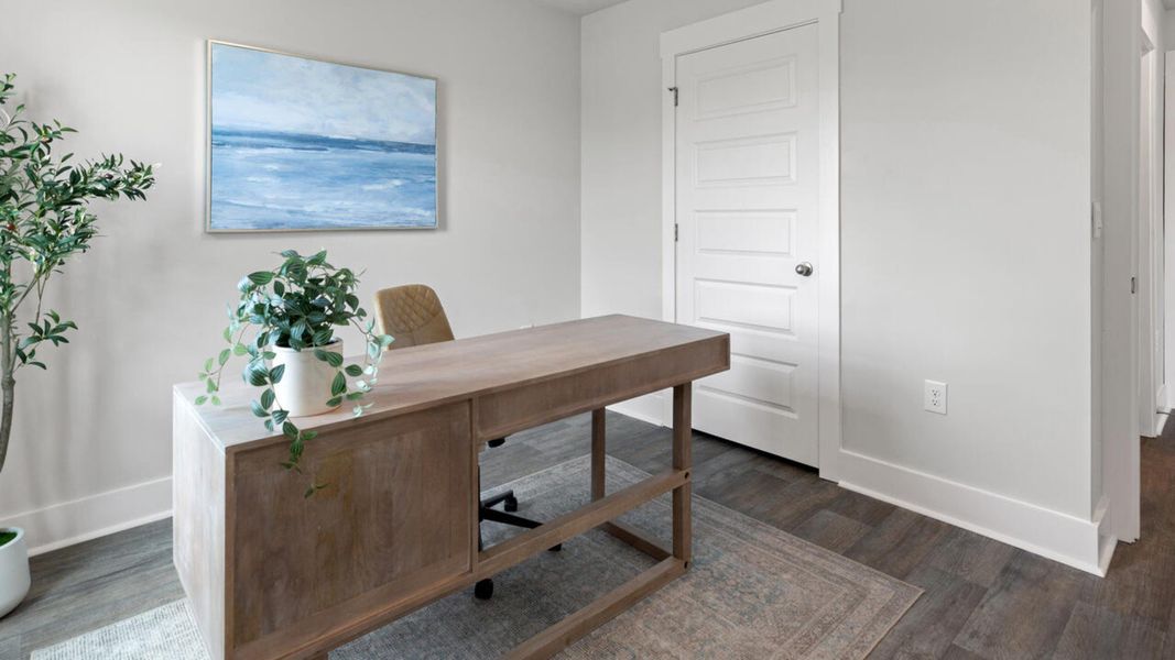 Furnished interior in a model home at Eagle Creek in Bolivia (Image 22).