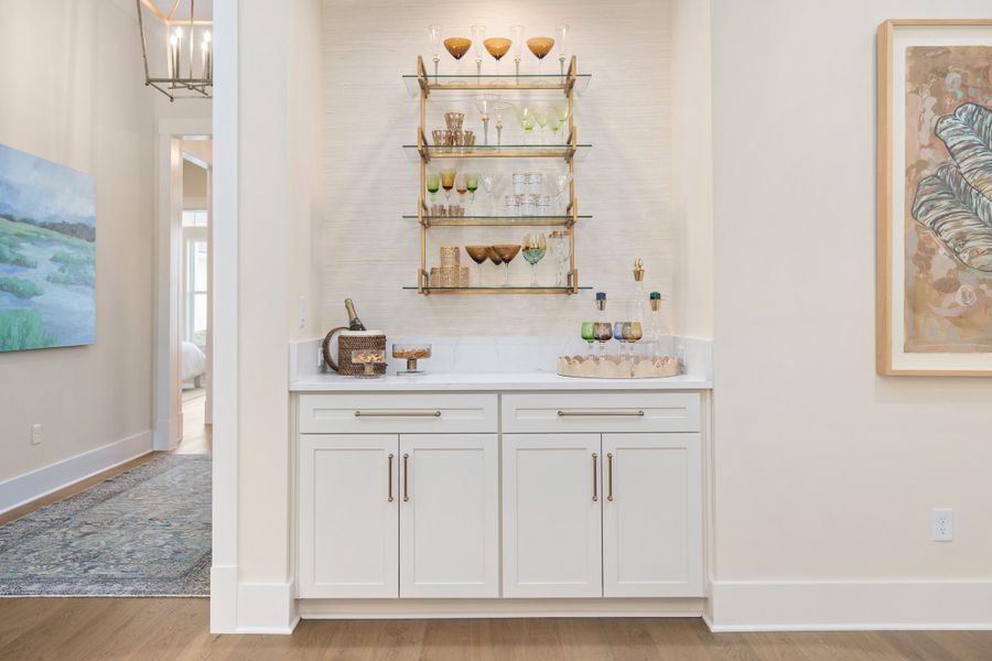 Furnished interior in a model home at Hidden Creek at SilverLeaf 80' Gold Series in St. Augustine (Image 85).