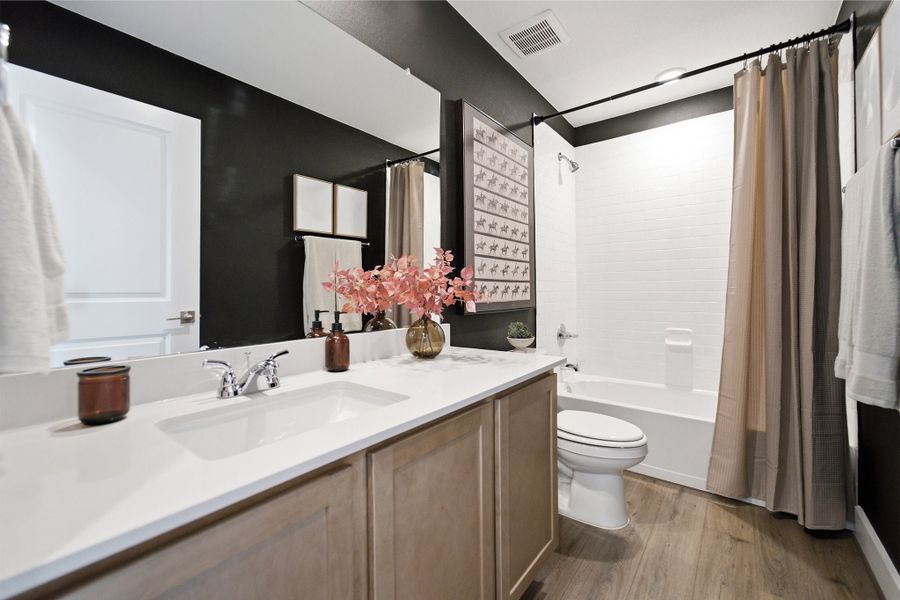 Furnished interior in a model home at Lone Oak in San Antonio (Image 37).