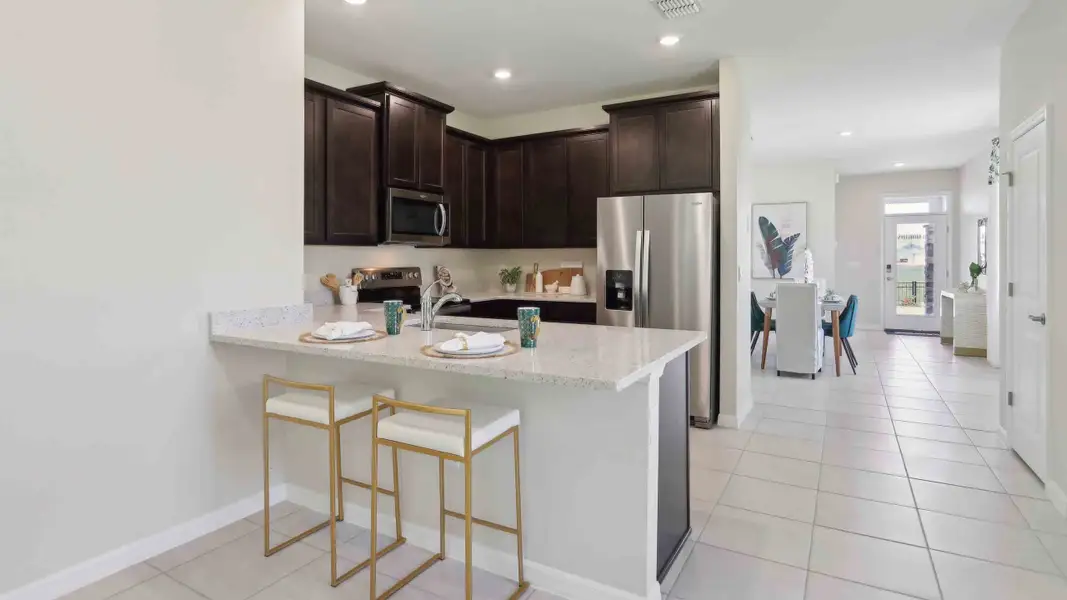 Furnished interior in a model home at Ocala Preserve in Ocala (Image 2).