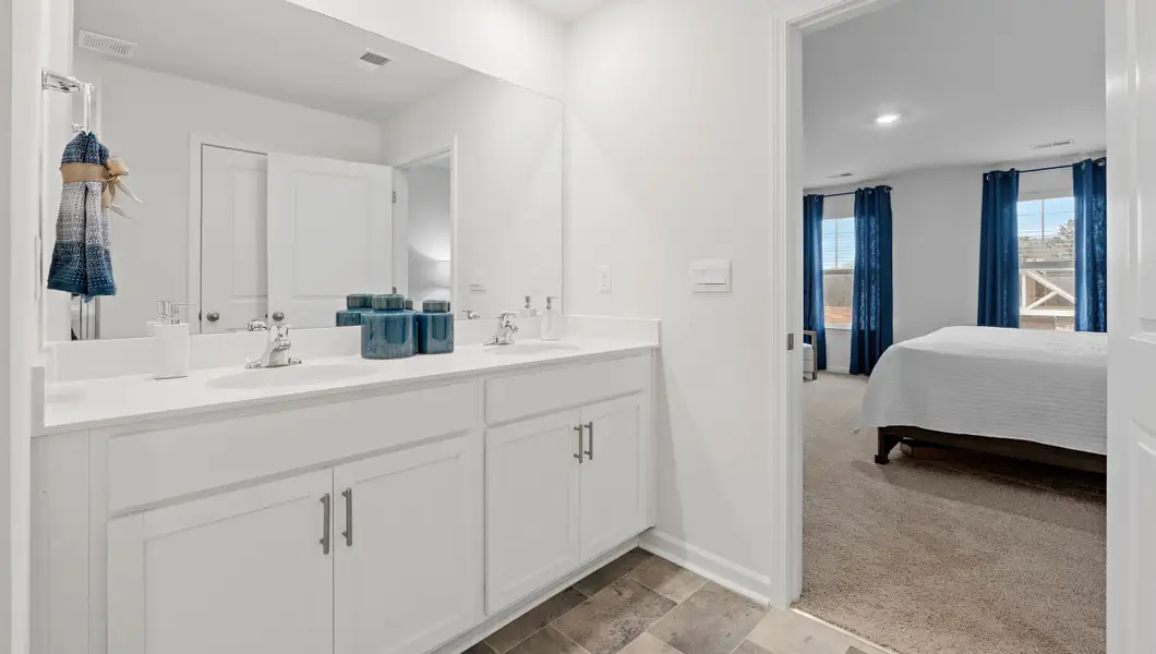 Furnished interior in a model home at Bentley Park in Greenwood (Image 29).