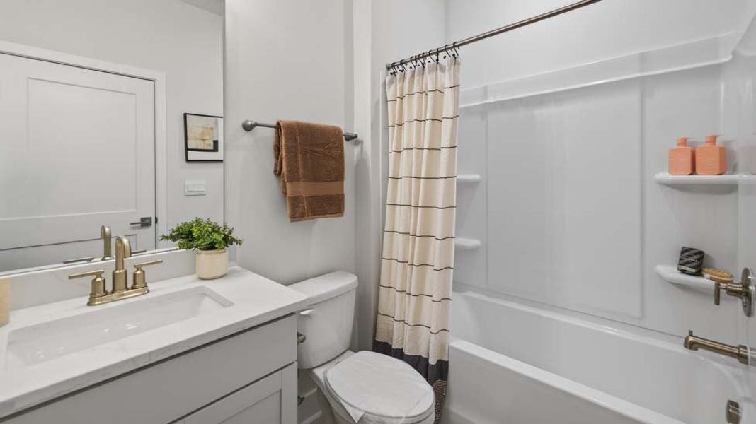 Furnished interior in a model home at Oak Grove Hill in Huntersville (Image 16). Furnished interior in a model home at Oak Grove Hill in Huntersville (Image 16).