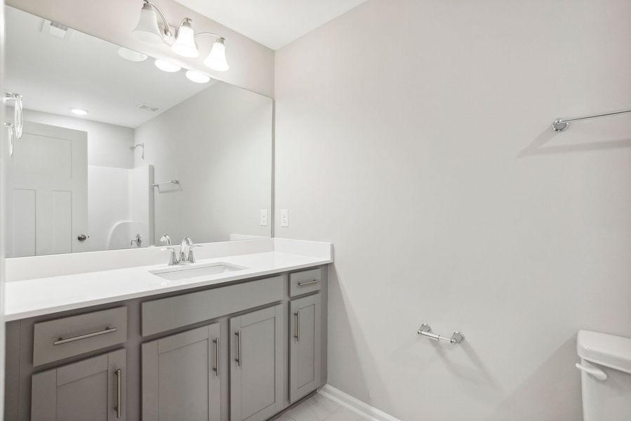 Furnished interior in a model home at Rourk Woods in Shallotte (Image 21).