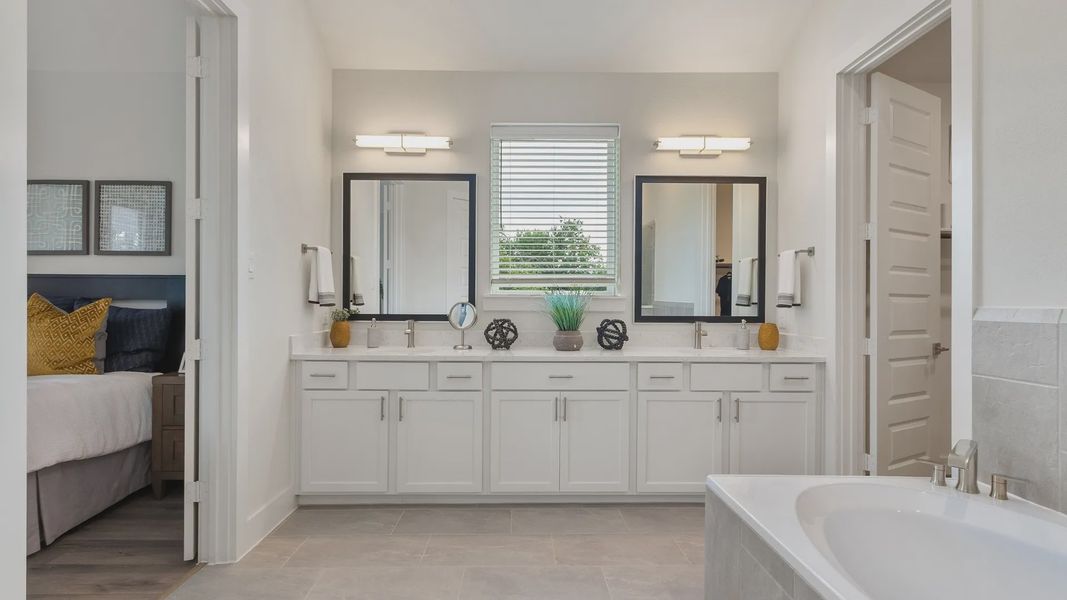 Furnished interior in a model home at Shady Acres in Houston (Image 15).