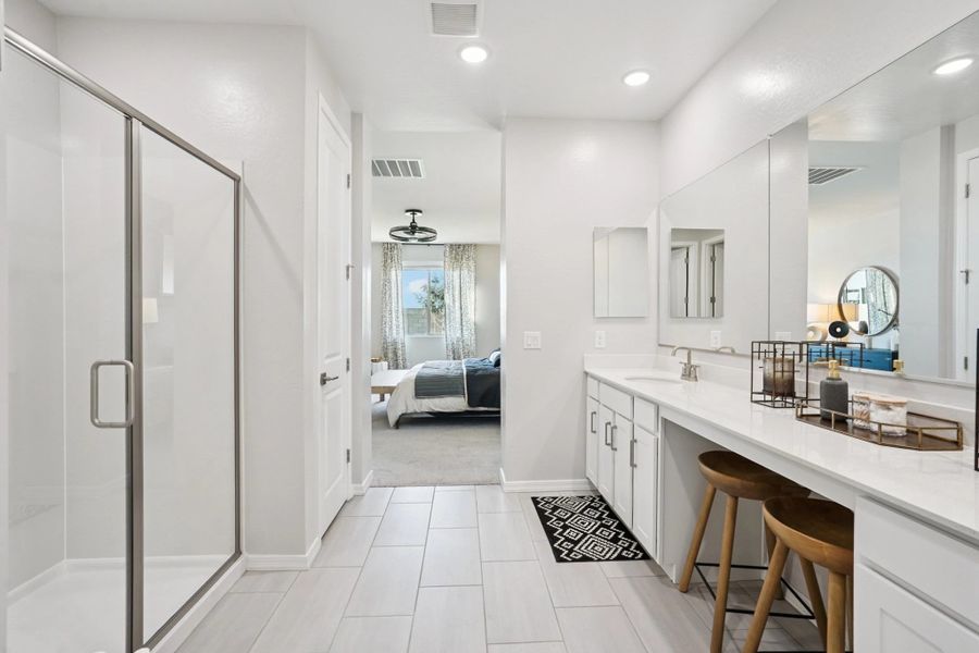 Furnished interior in a model home at Estates at Estrella Crossing in Phoenix (Image 9).