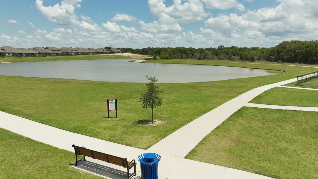 Enjoy tranquil pond views and lush green spaces in Southern Pointe, College Station, Texas.