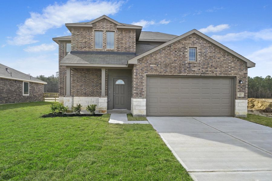 Front exterior of a home in the Clear View Estates community, located in Willis, TX (Image 5).