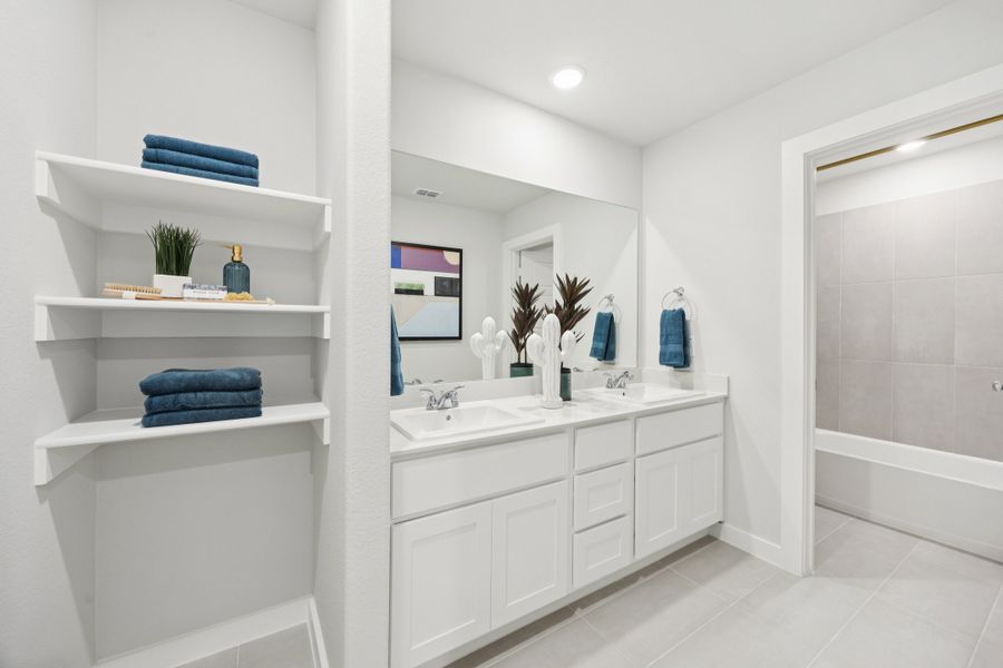 Bathroom in a Belmont Magnolia Model Home in Aubrey TX by Trophy Signature Homes Bathroom in a Belmont Magnolia Model Home in Aubrey TX by Trophy Signature Homes