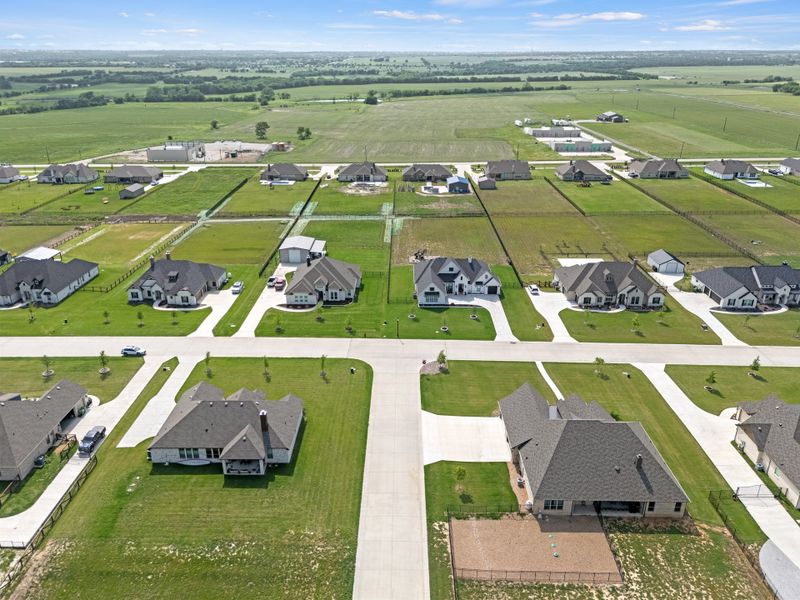 Aerial view of the Paloma Ranch community in Justin, TX, showing layout and nearby surroundings (Image 3).
