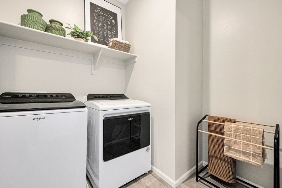 A kitchen with white appliances. A kitchen with white appliances.